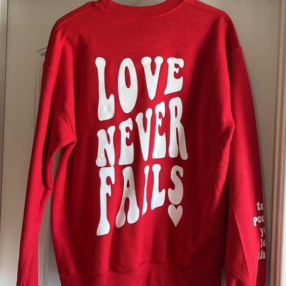 Brand new with tag. Red pullover. “Love never fails” - Picture 4 of 4